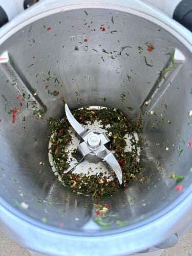 Garlic, chili and dill chopped in the TM Bowl