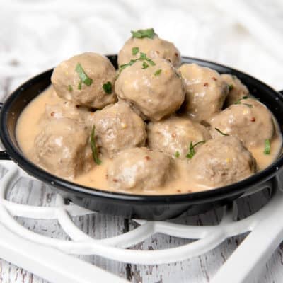 Square image Swedish Meatballs on white background