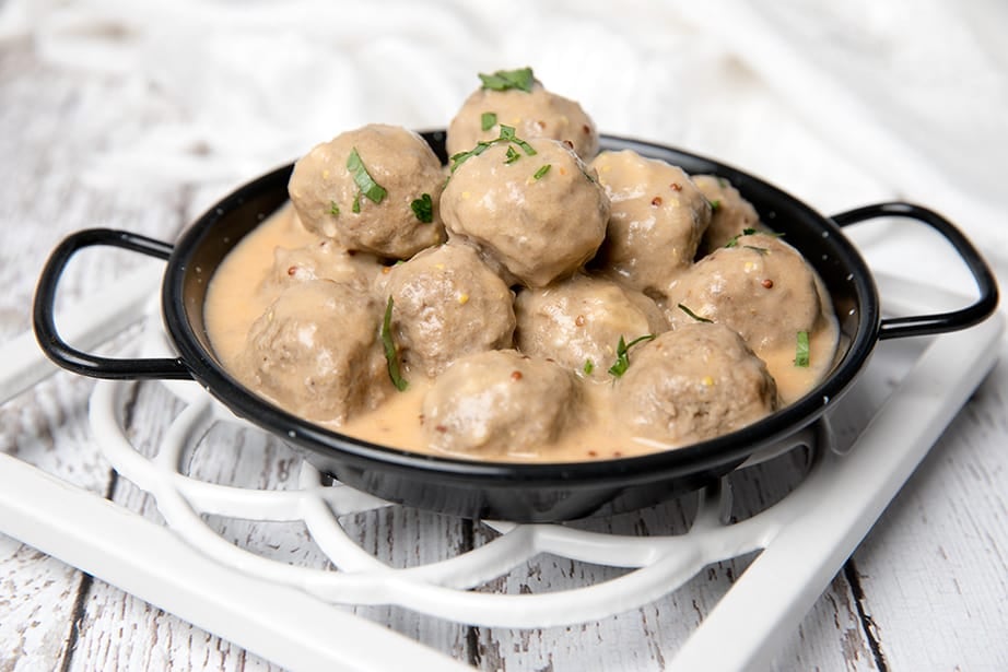 Square image Swedish Meatballs on white background