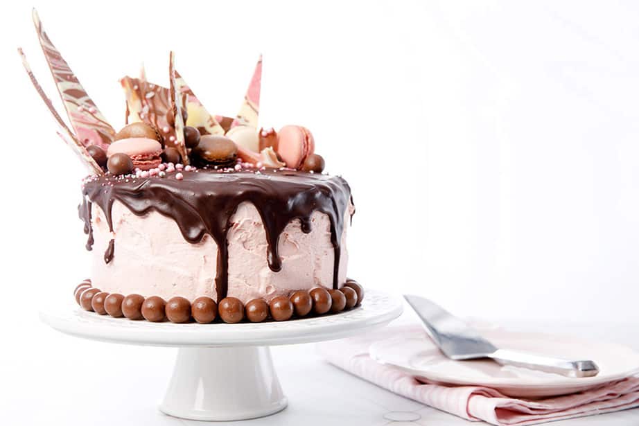 Chocolate Mud Drip Cake decorated on a white background