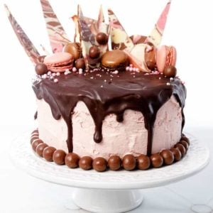 Chocolate Drip Cake with pink icing and chocolate drip