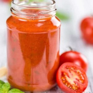 Napoletana Sauce in a glass jar white background