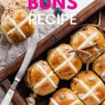 Hot Cross Buns in a tray with wording over it