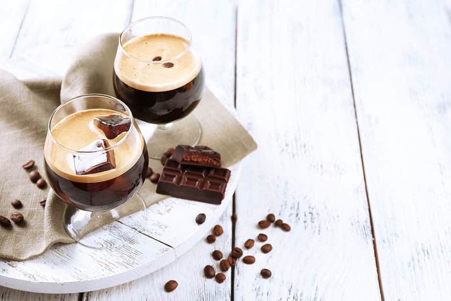 Espresso martini on a white wood background 