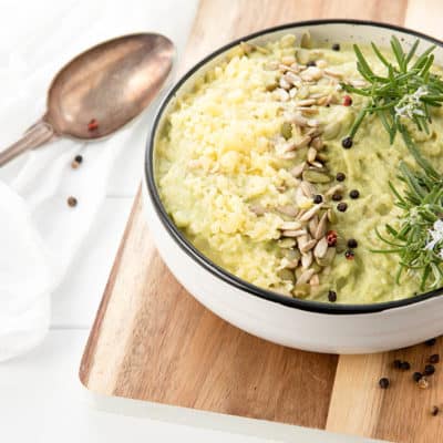 Loaded Mashed Cauliflour Thermomix recipe in a white bowl with a retro spoon