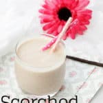 Image of a healthy smoothie made with milk on a napkin. The writing on it says scorched Peanut Bar