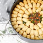 Profile picture Thermomix Shepherds Pie with potato gems in a round backing dish on white background