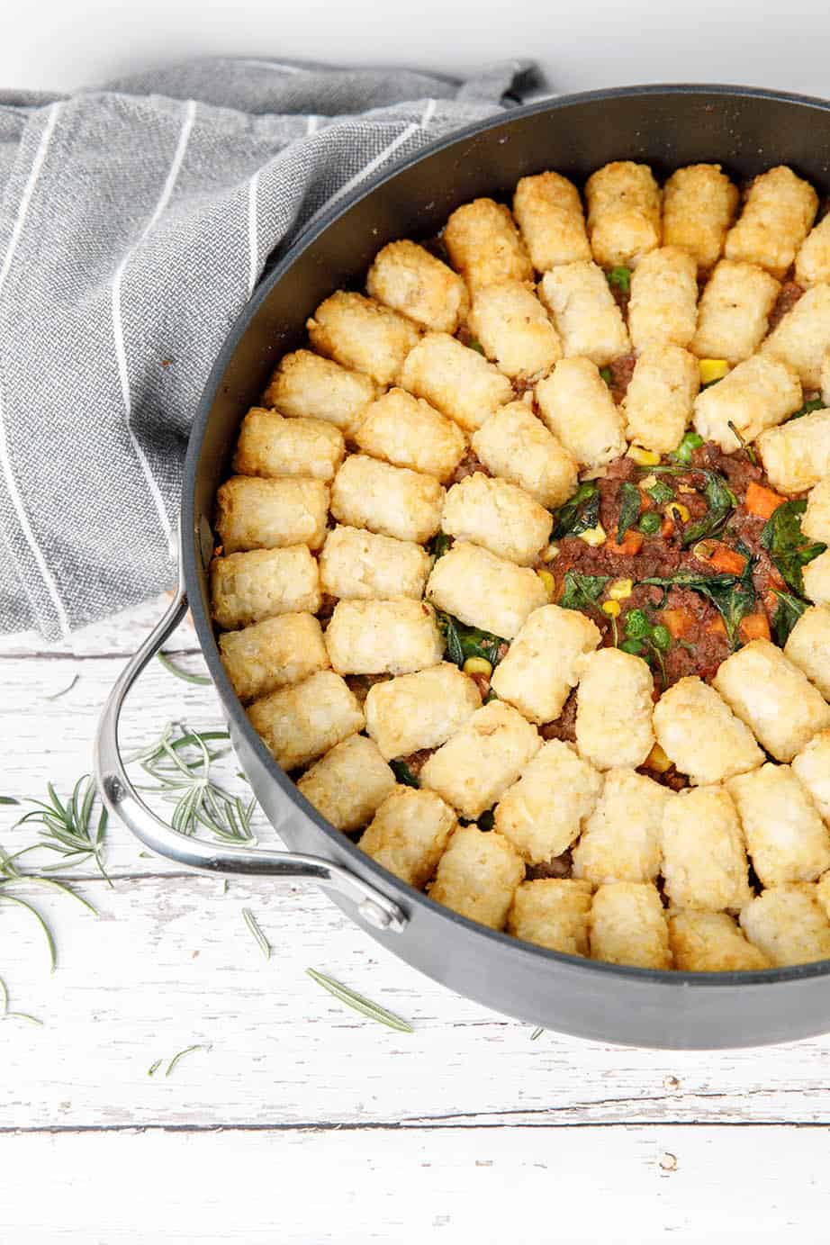 Profile picture Thermomix Shepherds Pie with potato gems in a round backing dish on white background