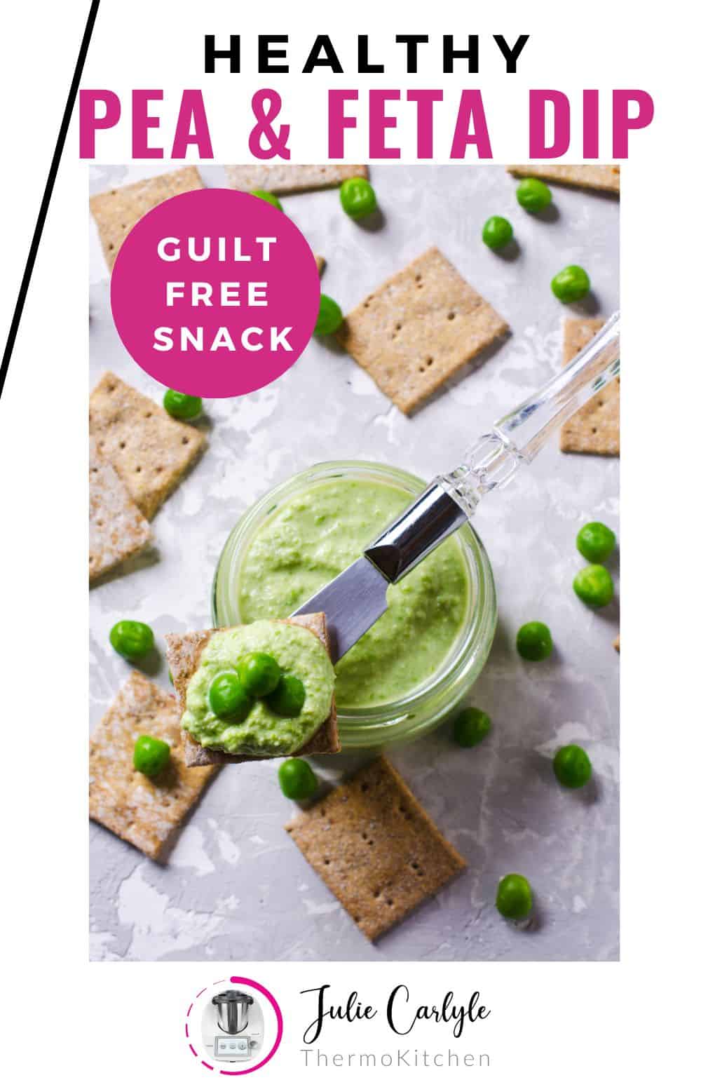 Overhead close up of smashed Bean and Pea Dip and crackers on a grey background