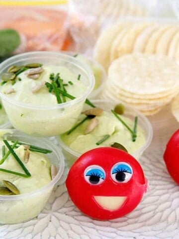 Babybel smiley Cheese on a plate with other lunchbox ideas