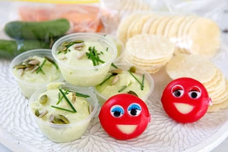 Babybel smiley Cheese on a plate with other lunchbox ideas