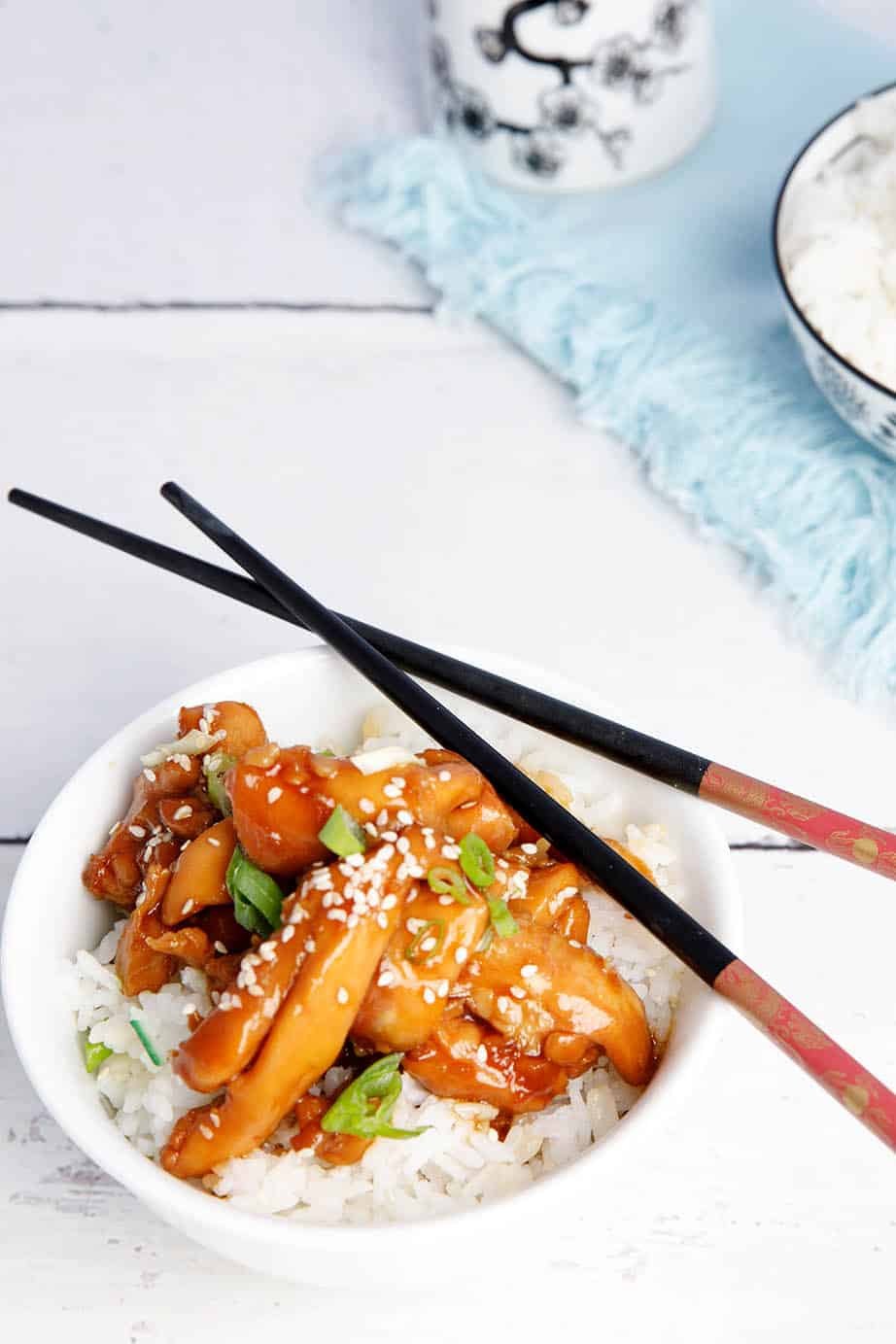 Overhead shot Chicken teriyaki on rice with chopsticks