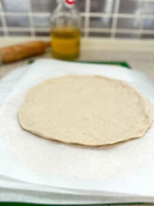 pizza bases rolled and ready for topping