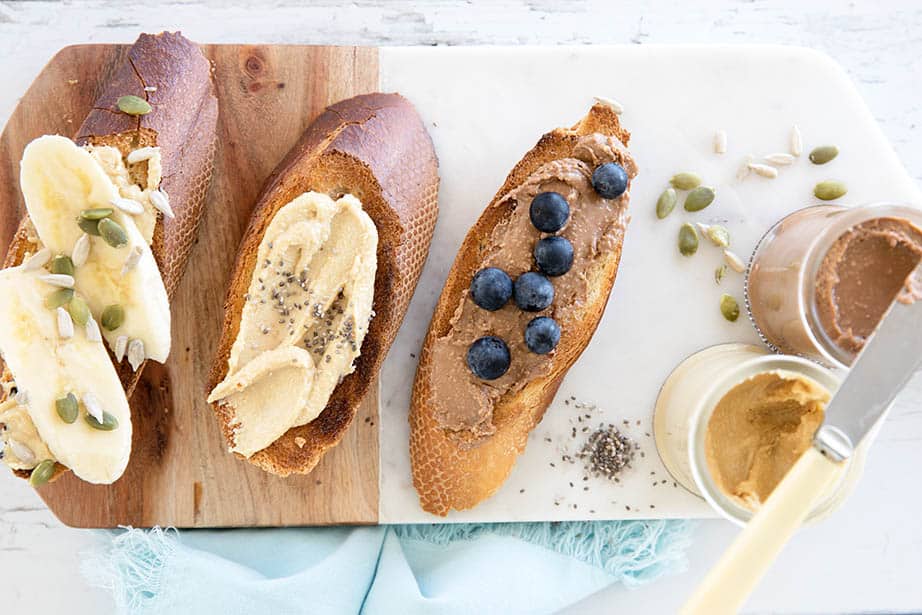 Peanut butter on toast with banana and blueberries