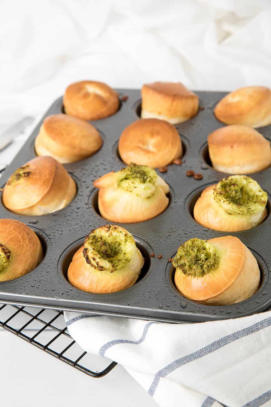 Brazilian Cheese puffs in a tray cooling