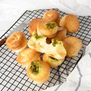 Overhead shot of Brazilian Cheese puffs on a cooling tray.