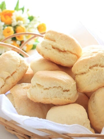 Fluffy Scones on white crockery and white background