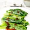 Asian Greens in Oyster sauce on a white plate