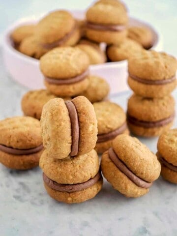 Homemade Kingston biscuits on background and in a bowl