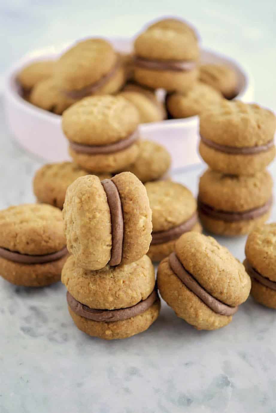 Homemade Kingston biscuits on background and in a bowl