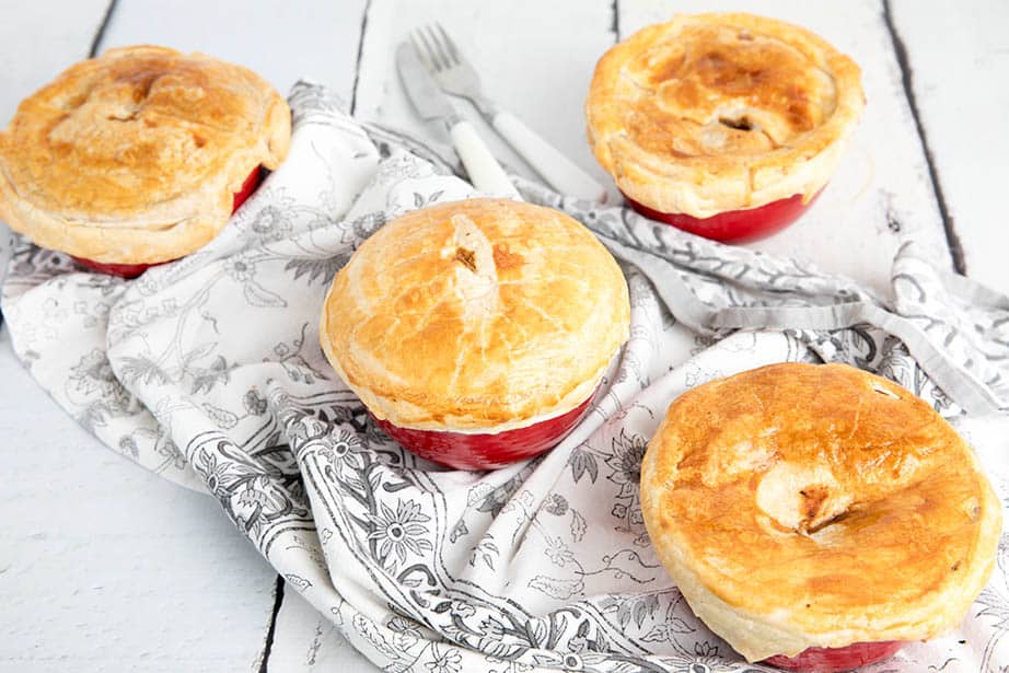 Peppercorn Meat Pie on a white board background