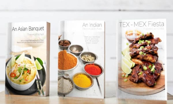 Three Thermomix cookbooks on a shelf