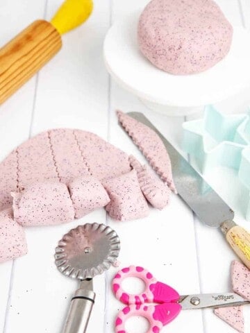 White table with Thermomix playdough and cookie cutters