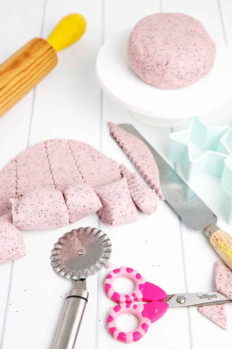 White table with Thermomix playdough and cookie cutters