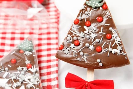 chocolate mint fudge in the shape of a Christmas tree on white and red background