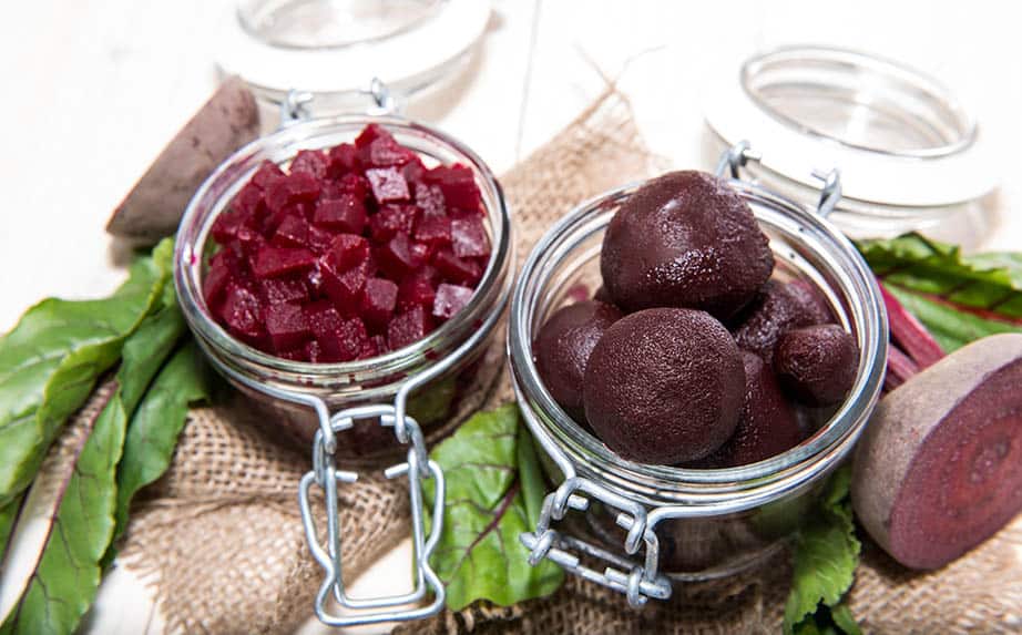 Pickled beetroot on a hessian cloth and white background