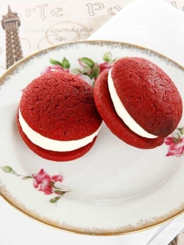 Red Velvet Whoopie pie on a floral cake plate