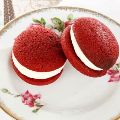 Red Velvet Whoopie pie on a floral cake plate