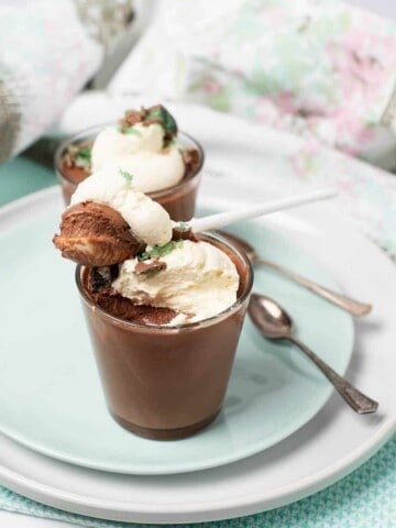 Chocolate Peppermint Mousse in a glass with a spoonful lifted out