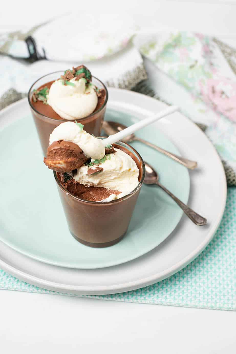 Two Chocolate Peppermint mousses with a spoon for eating