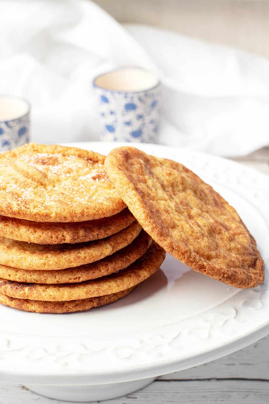 Close Up Caramilk Snickerdoodle Cookies in a stack on a white platter