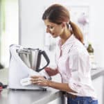 A woman attaching a Cook-key to a TM5