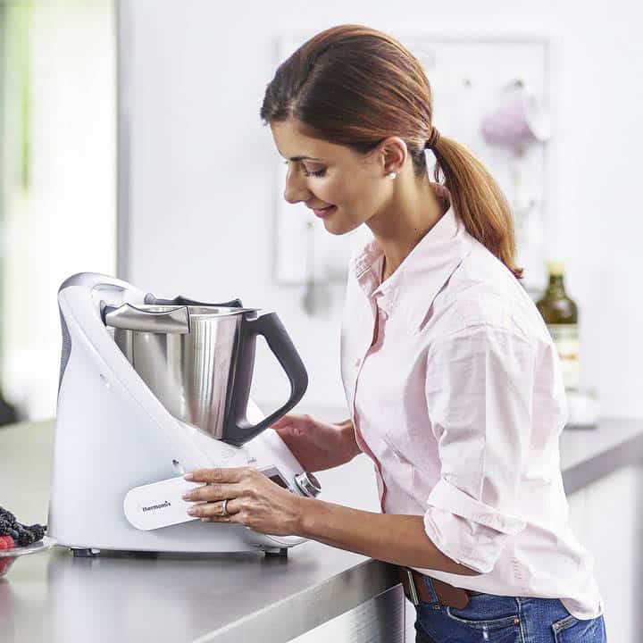 A woman attaching a Cook-key to a TM5