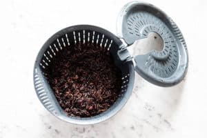 Black rice in the internal steam basket to be steamed