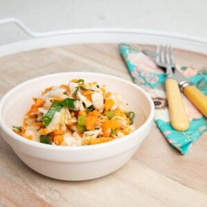 Thermomix Coleslaw in a bowl on a wooden background