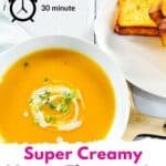 30 minute Creamy sPumpkin Soup Title with a bowl of pumpkin soup and garlic bread on a plate.