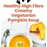 Creamy Pumpkin Soup Image with garlic bread on a white background with the words Healthy High Fibre Creamy Vegetarian Pumpkin Soup written on the top