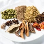 Individual Garam Masala Spices on a white plate