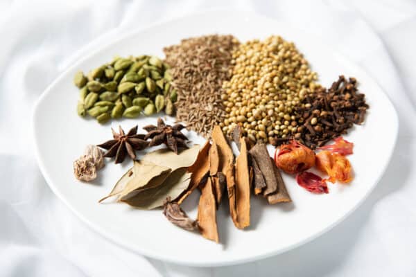Individual Garam Masala Spices on a white plate