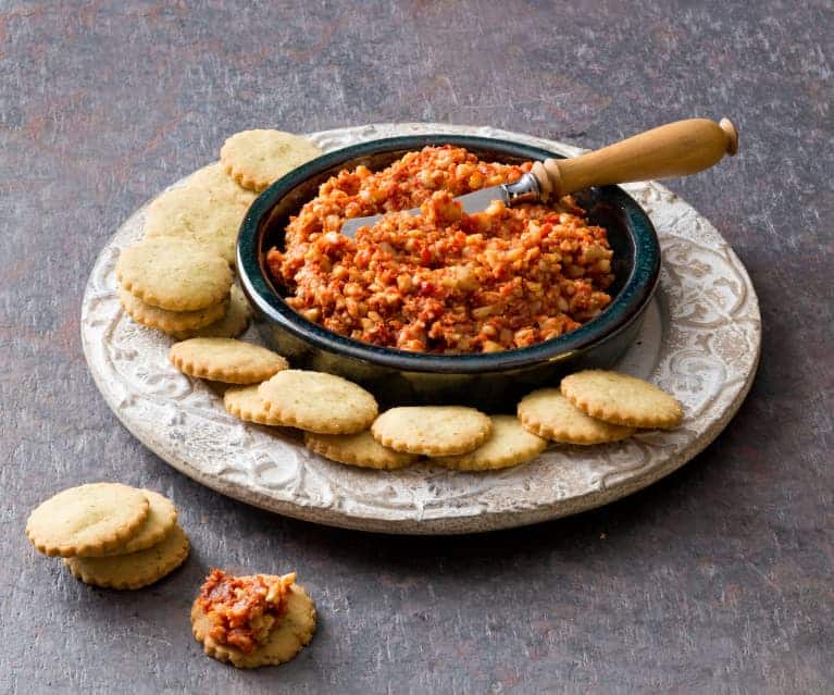 Thermomix sundried Tomato Dip just like red rock version in a bowl with crackers