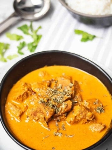 Madras Lamb Curry Thermomix recipe on striped background