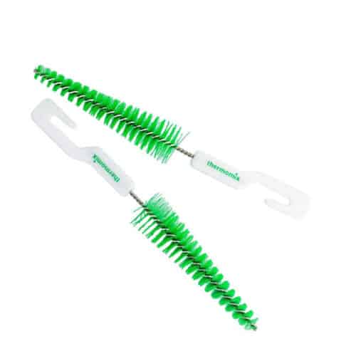 Two Green Bristled Thermomix Blade Brushes on a white background