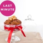 Thermomix Christmas Cake Pin, labelled in red, and pink on a white background