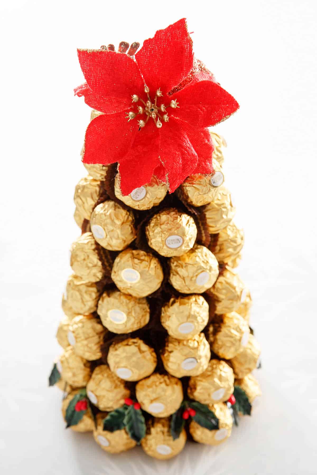 Single Ferrero Rocher Christmas Tree with a Merry Christmas sign on a white background