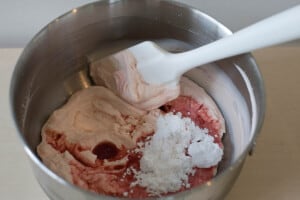 Stir morello cherries through the cream mixture.