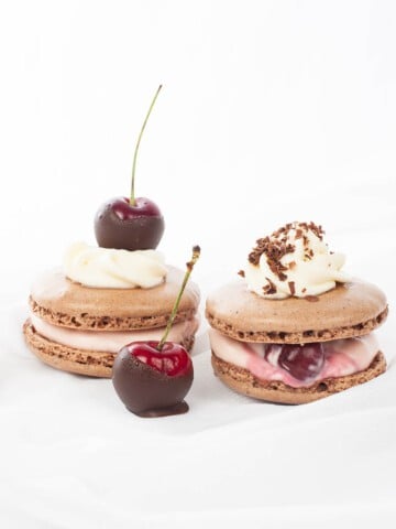 Black Forest Chocolate Macarons Thermomix on White background.
